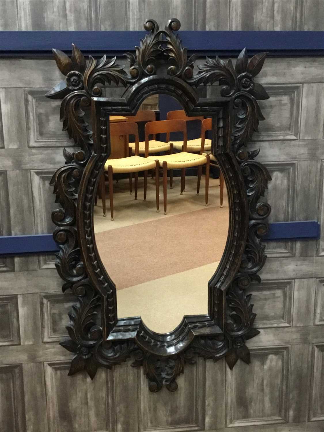 Lot 810 - A BAROQUE STYLE WALL MIRROR