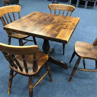 Lot 177 - AN OAK DINING TABLE AND FOUR CHAIRS