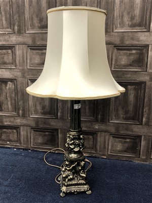 Lot 142 - A TABLE LAMP AND A WALL MIRROR