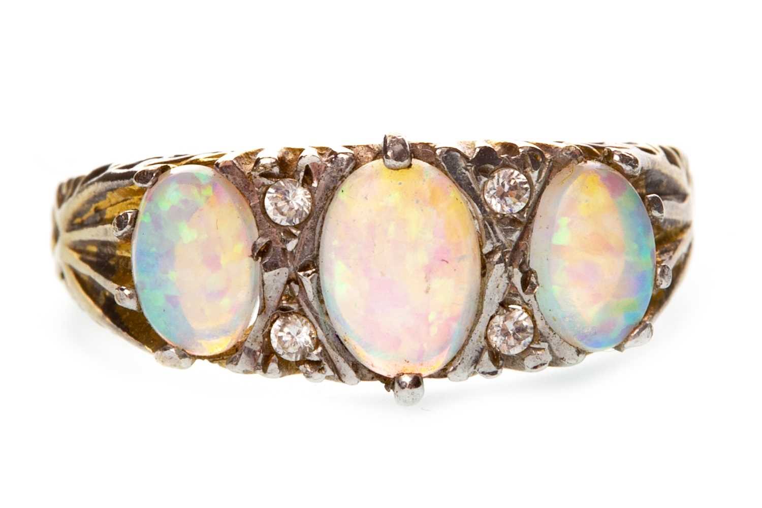 Lot 28 - AN OPAL AND DIAMOND RING