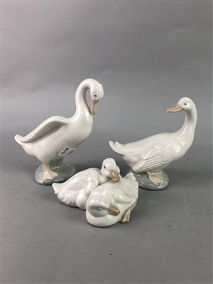 Lot 300 - A LLADRO FIGURE OF A POLAR BEAR AND THREE NAO FIGURES OF SWANS
