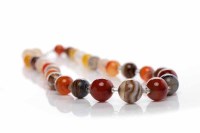 Lot 164 - AGATE BEAD NECKLACE with graduated spherical...