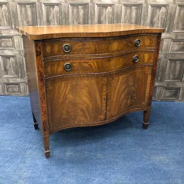 Lot 318 - A 20TH CENTURY REPRODUCTION SERPENTINE CUPBOARD CHEST