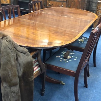 Lot 313 - A MAHOGANY EXTENDING DINING TABLE AND SIX CHAIRS