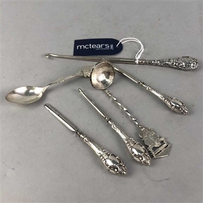 Lot 347 - FOUR SILVER HANDLED CUTICLES AND TWO TEASPOONS