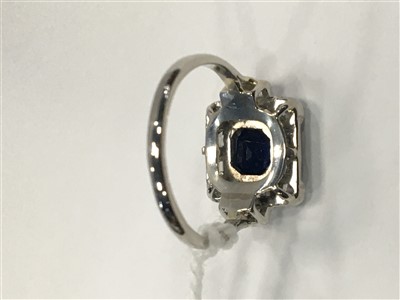 Lot 54 - A BLUE GEM AND DIAMOND RING