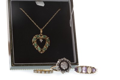 Lot 58 - A GREEN GEM SET PENDANT AND TWO RINGS