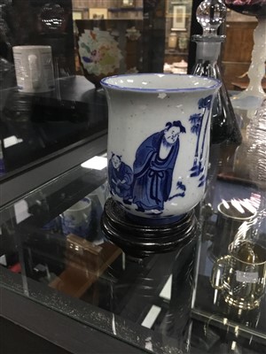 Lot 438 - A LATE QING CHINESE BLUE AND WHITE BEAKER