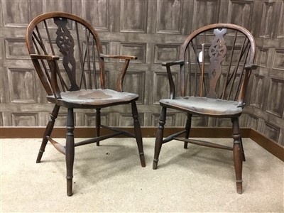 Lot 92 - A PAIR OF EARLY 19TH CENTURY YEW-WOOD AND ELM WHEEL BACK WINDSOR CHAIRS
