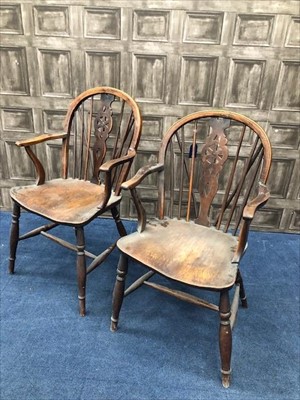 Lot 92 - A PAIR OF EARLY 19TH CENTURY YEW-WOOD AND ELM WHEEL BACK WINDSOR CHAIRS