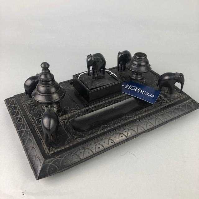 Lot 38 - AN EARLY 20TH CENTURY EBONY DESK STAND AND A JEWELLERY CASKET