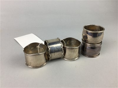 Lot 83 - A LOT OF FIVE SILVER NAPKIN RINGS