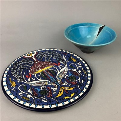 Lot 286 - AN ART POTTERY DISH, PLATE AND A CANDLESTICK