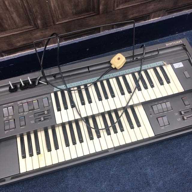 Lot 265 - AN ELECTRIC ORGAN