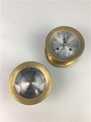 Lot 122 - A BRASS CASED SHIP'S BAROMETER AND CLOCK