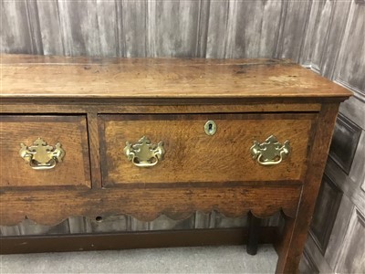 Lot 887 - A MID 18TH CENTURY OAK AND ELM BACKLESS DRESSER