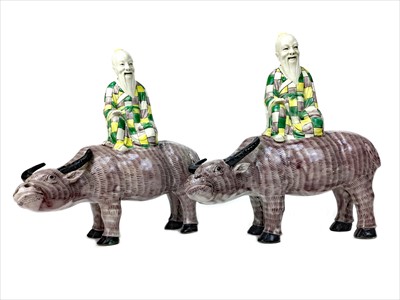 Lot 1119 - A LOT OF TWO EARLY 20TH CENTURY CHINESE MODELS OF BUFFALO AND RIDER