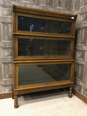 Lot 917 - AN OAK STACKING BOOKCASE