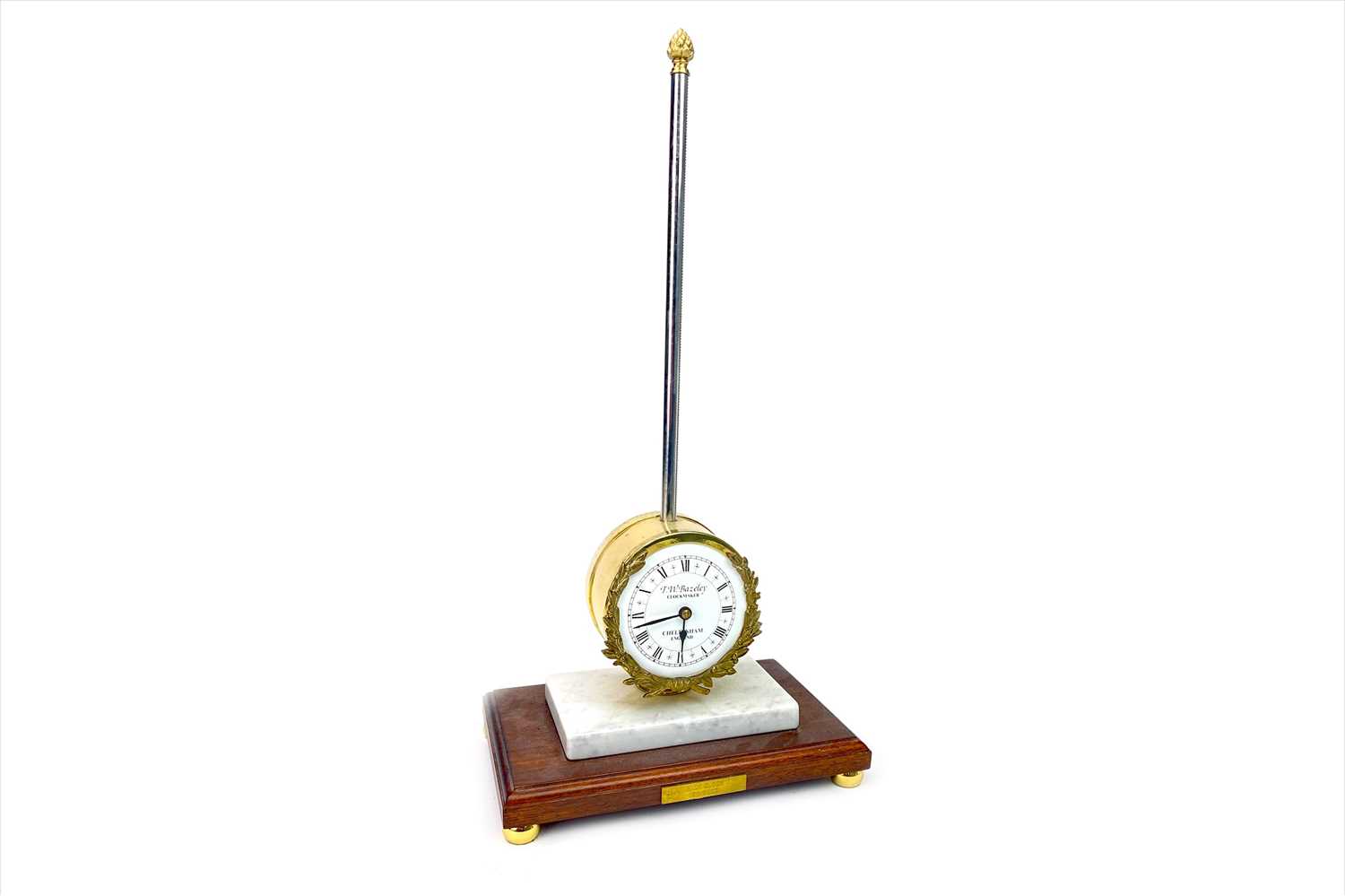 Lot 1123 - A REPRODUCTION RACK CLOCK BY T.W. BAZELEY