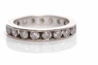 Lot 236 - DIAMOND SET ETERNITY RING with channel set...
