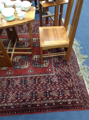 Lot 255 - A 20TH CENTURY EASTERN FRINGED AND MULTI BORDERED CARPET