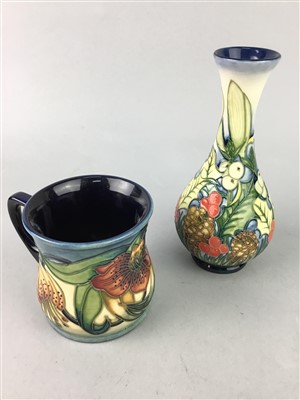 Lot 217 - A MOORCROFT VASE, A MOORCROFT MUG AND ANOTHER TWO VASES