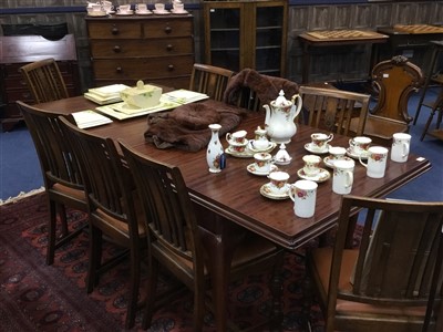 Lot 331 - A MAHOGANY DINING TABLE AND EIGHT CHAIRS