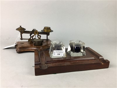 Lot 358 - A MAHOGANY INK STAND, POSTAL SCALES AND A VINTAGE TOOL