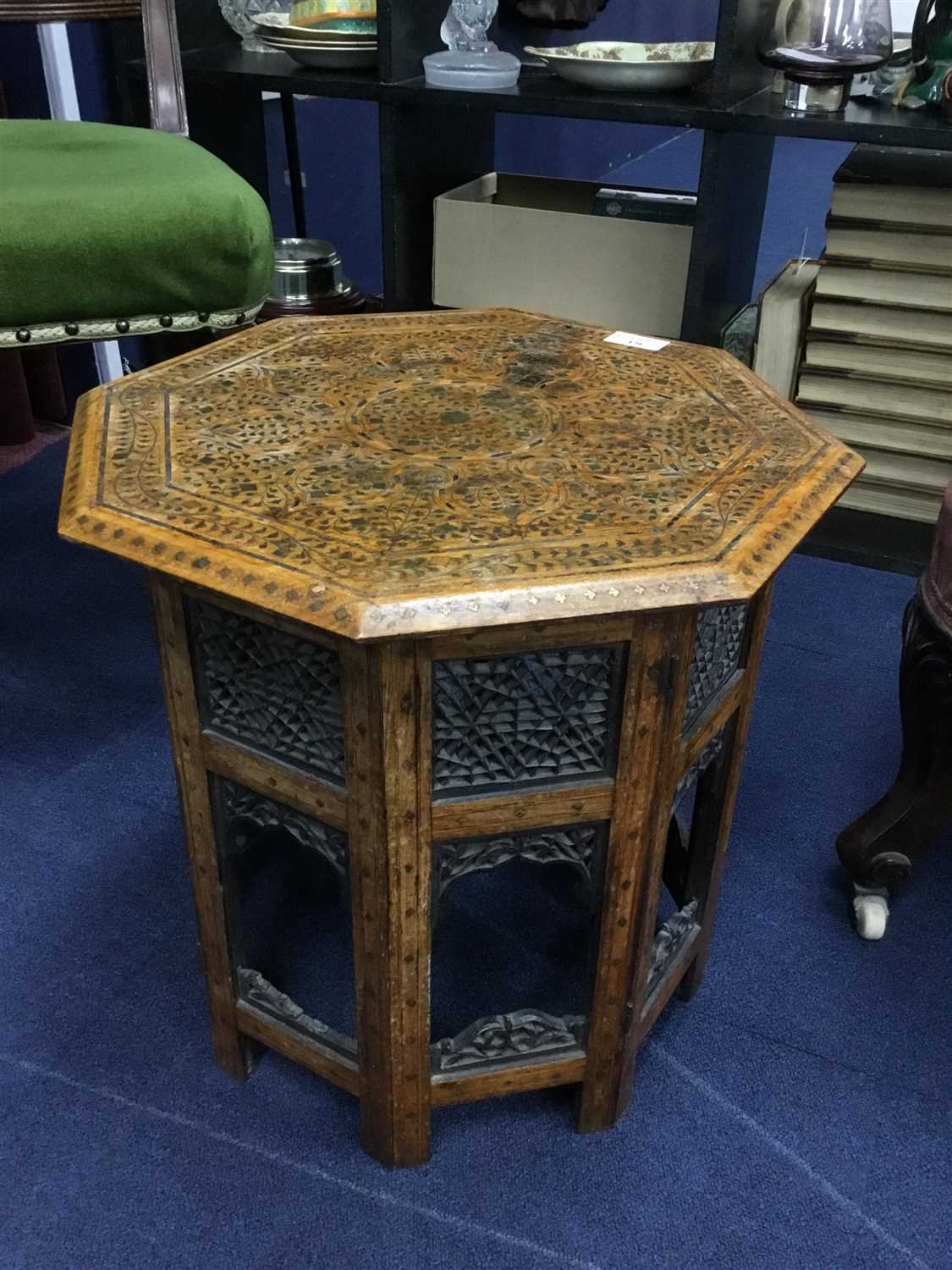 Lot 379 - AN EASTERN FOLDING OCCASIONAL TABLE