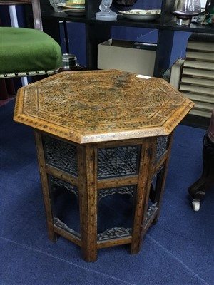 Lot 379 - AN EASTERN FOLDING OCCASIONAL TABLE