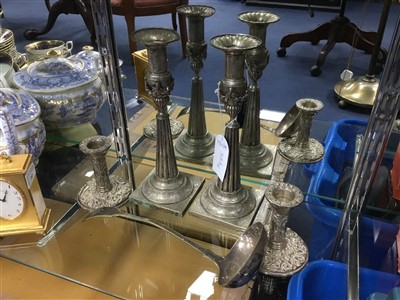 Lot 383 - A LOT OF TWO PAIRS OF CANDLESTICKS AND A LADLE