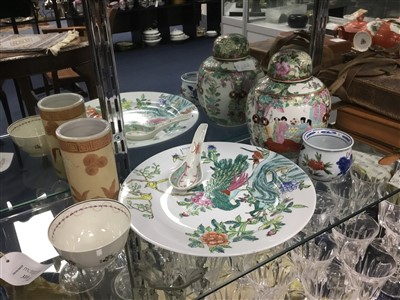 Lot 414 - A CHINESE FAMILLE ROSE GINGER JAR AND COVER, TWO TEA BOWLS, A BRUSH POT AND A SPOON