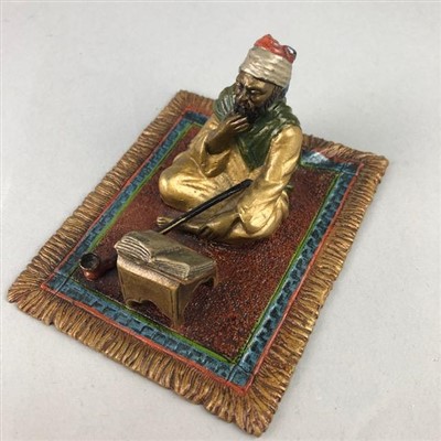 Lot 24 - A COLD PAINTED BRONZE FIGURE