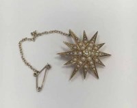 Lot 287 - PEARL AND DIAMOND SET STAR BROOCH with a...