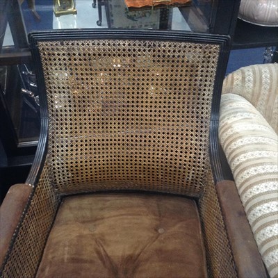 Lot 197 - A 19TH CENTURY CANE PANELLED ARMCHAIR