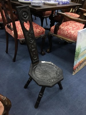 Lot 115 - A LATE 19TH CENTURY CARVED SPINNING CHAIR