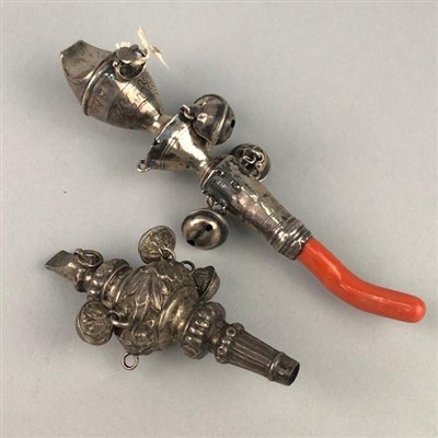 Lot 227 - A SILVER AND CORAL RATTLE/WHISTLE AND ANOTHER