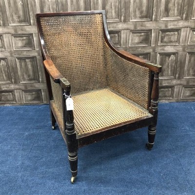 Lot 244 - A 19TH CENTURY CANE PANELLED ARMCHAIR