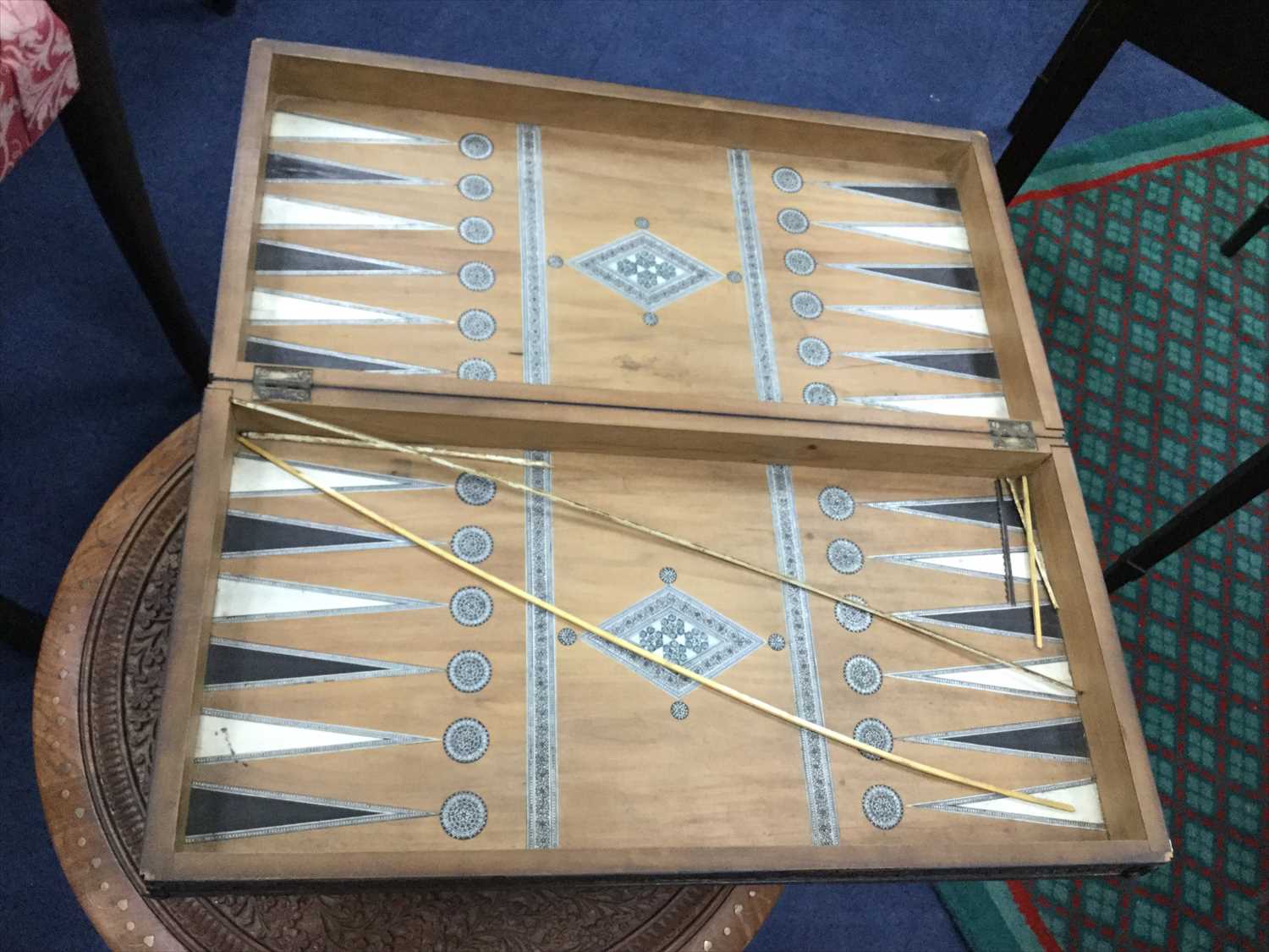 Lot 248 AN EASTERN INLAID GAMES BOX AND TWO BOOKS