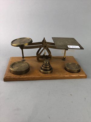 Lot 256 - A SET OF BRASS AND OAK POSTAL SCALES AND FIELD GLASSES