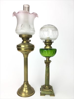 Lot 1650 - A BRASS OIL LAMP AND ANOTHER LAMP