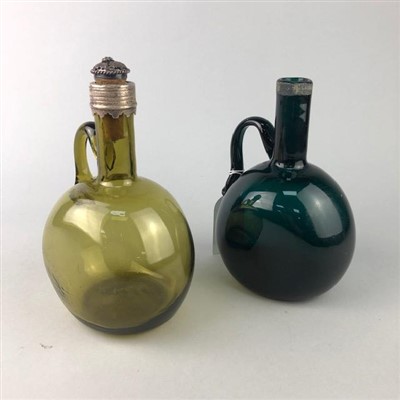 Lot 216 - AN EARLY VICTORIAN GLASS FLASK JUG AND ANOTHER
