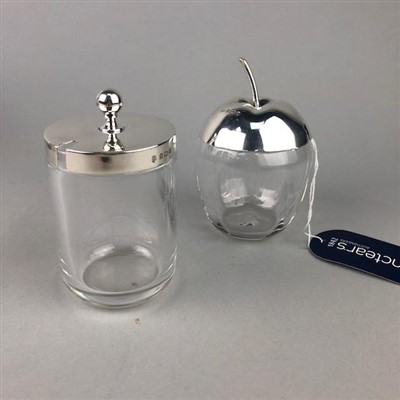 Lot 220 - AN EDWARDIAN SILVER LIDDED GLASS APPLE SHAPED PRESERVE JAR AND ANOTHER