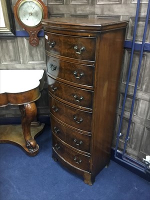 Lot 287 - A WALNUT BOW FRONTED PEDESTAL CHEST