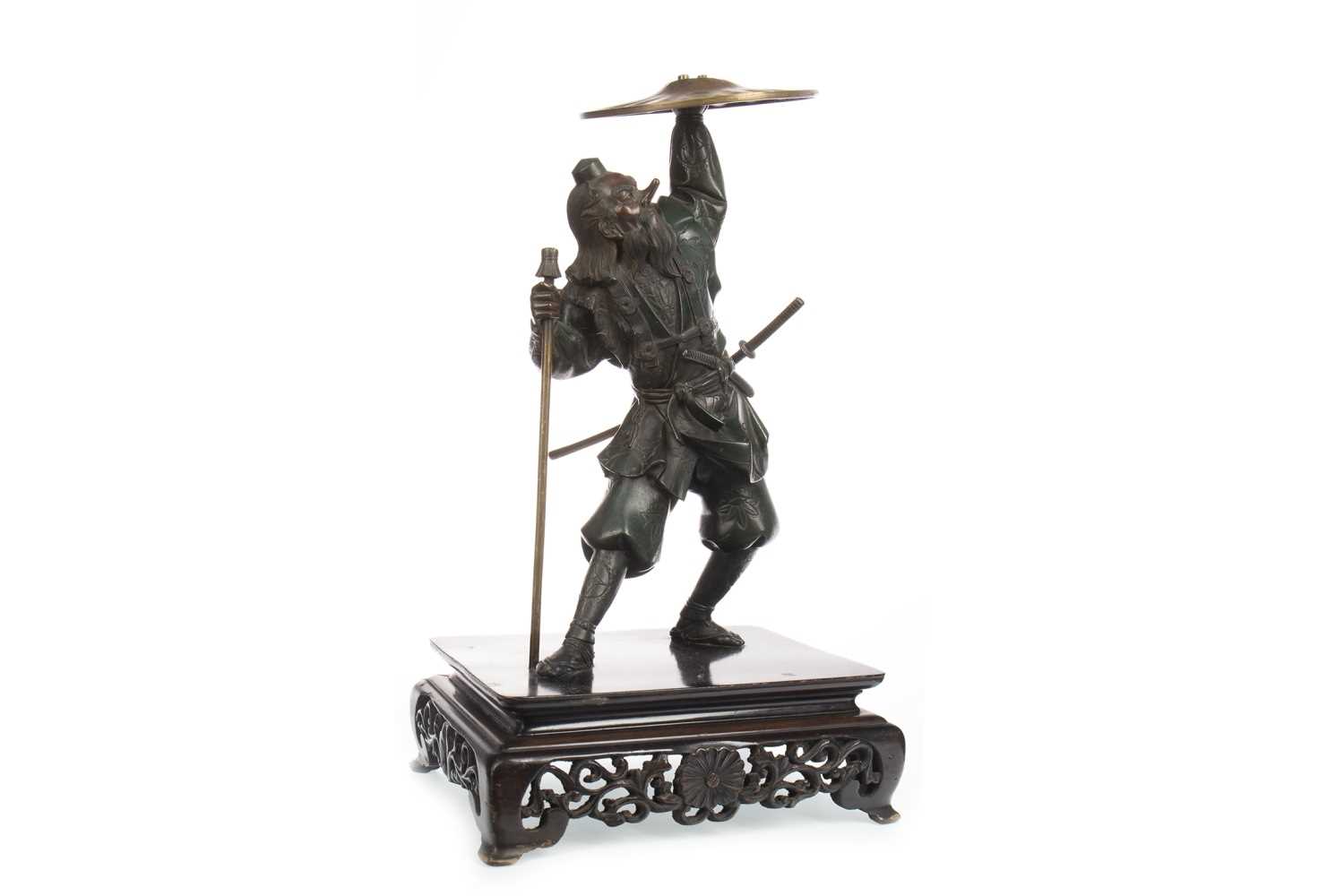 Lot 1133 - A CHINESE BRONZED METAL WARRIOR FIGURE