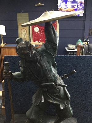 Lot 1133 - A CHINESE BRONZED METAL WARRIOR FIGURE