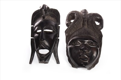 Lot 1061 - A LOT OF SEVEN AFRICAN WOOD WALL MASKS