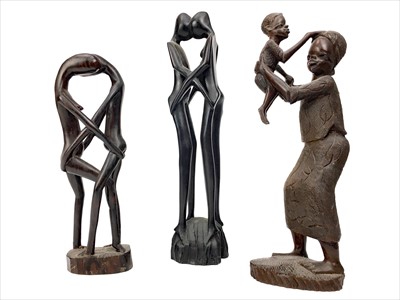 Lot 411 - A 20TH CENTURY AFRICAN CARVED WOOD FIGURE GROUP OF A MOTHER AND CHILD