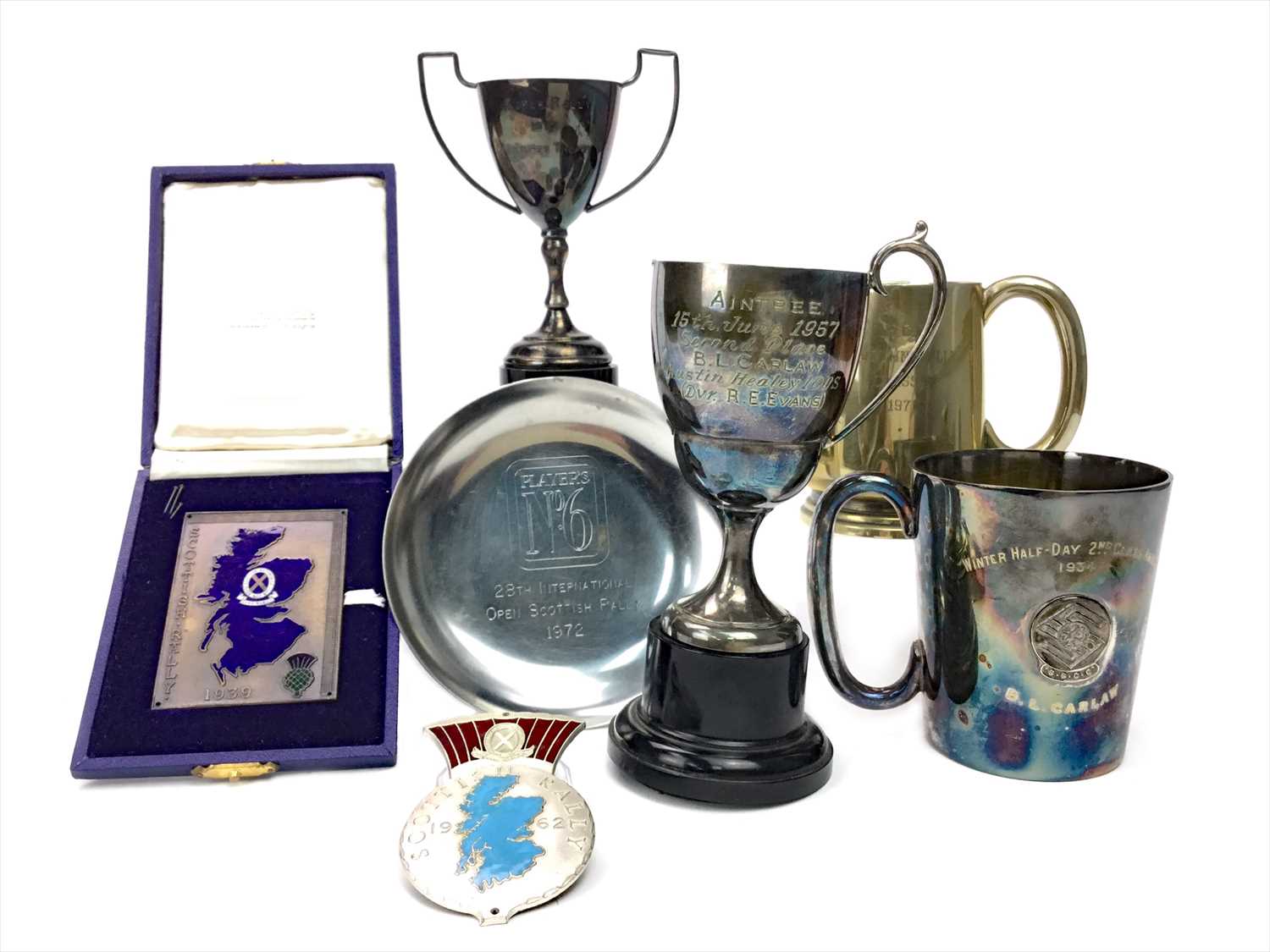 Lot 1723 - RACING INTEREST - MID-CENTURY RACING TROPHIES ALONG WITH TWO ENAMEL BADGES