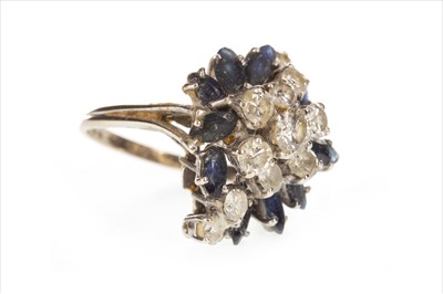 Lot 371 - A BLUE GEM AND DIAMOND RING